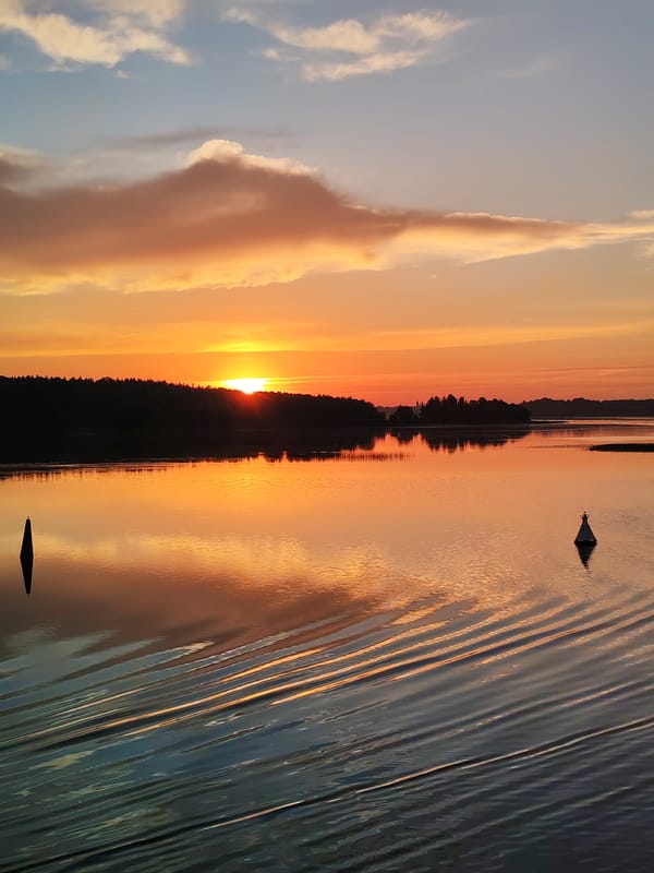 Sunset photographed over water in Терехово, Russia