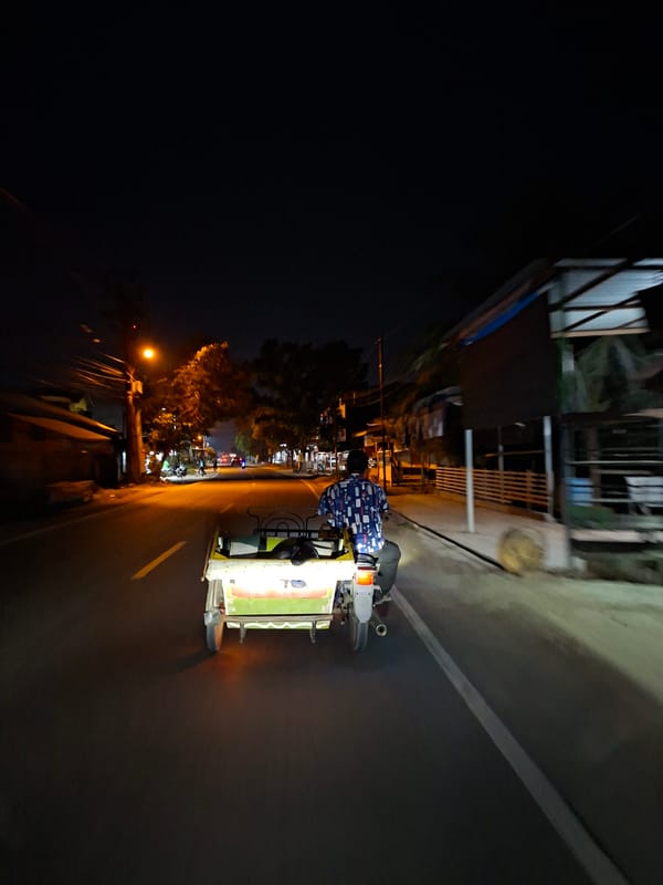 Evening motorcycle rider captured on Lhokseumawe streets