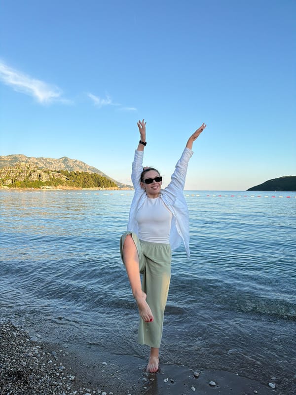 Woman photographed at Budva beach during summer afternoon