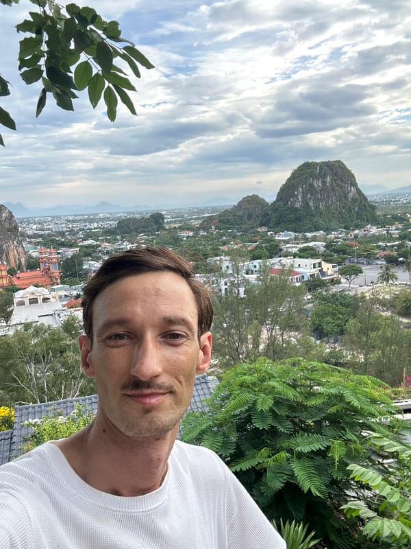 Selfie with Đà Nẵng's green mountain backdrop