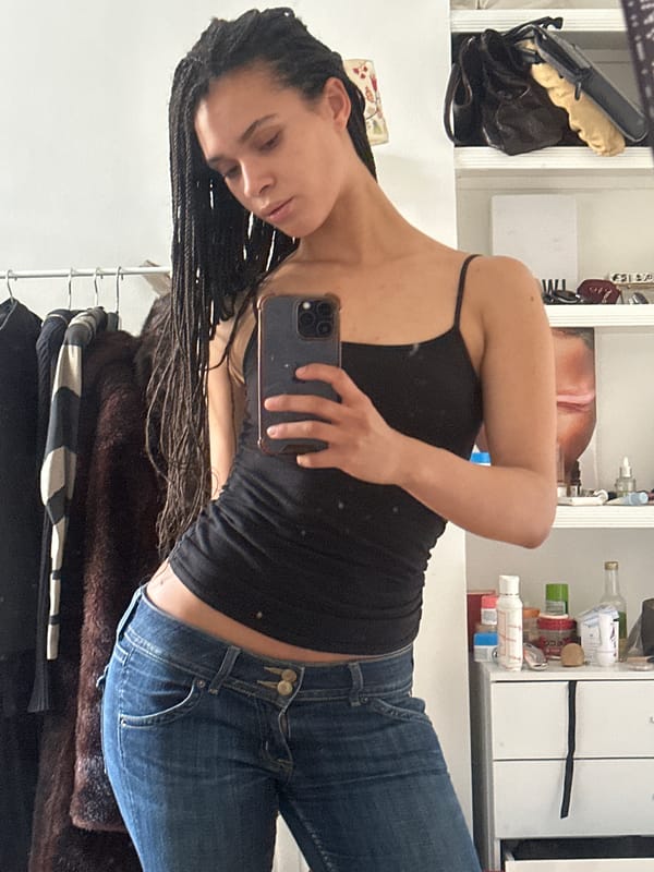 Woman takes mirror selfie in London residence