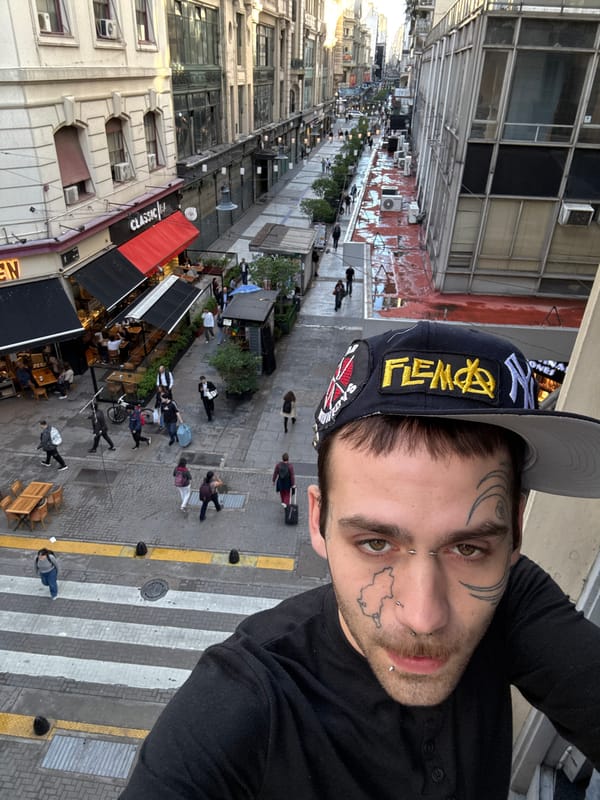 Man Takes Selfie from Elevated Position in Buenos Aires