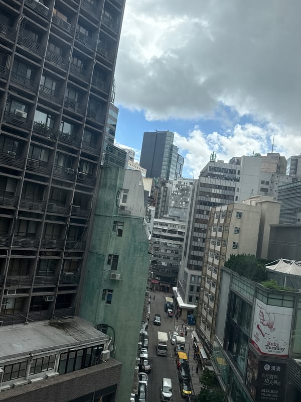 Overhead look at a busy commercial street in Hong Kong