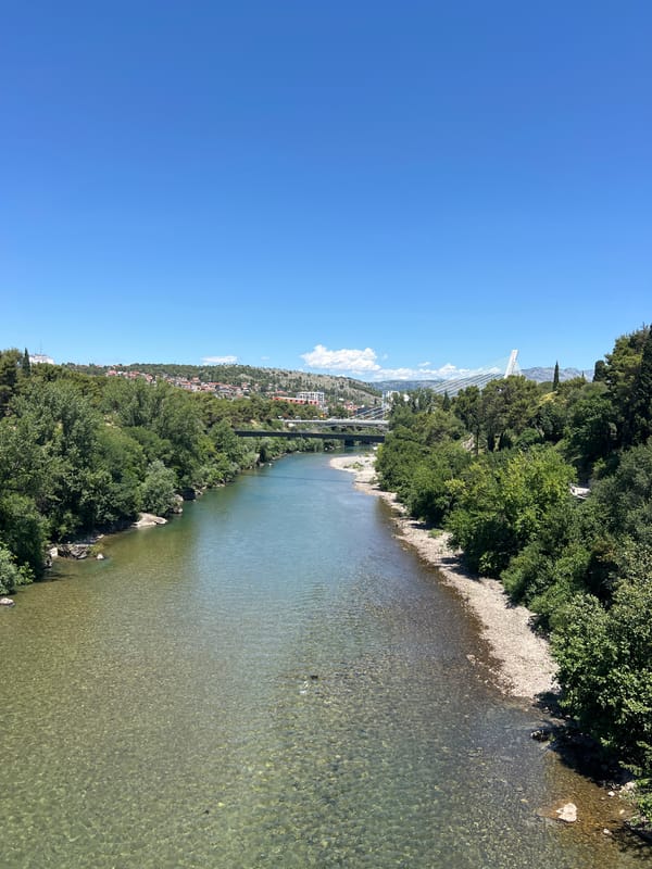 Morning perspectives across Podgorica's rivers, mountains and streets