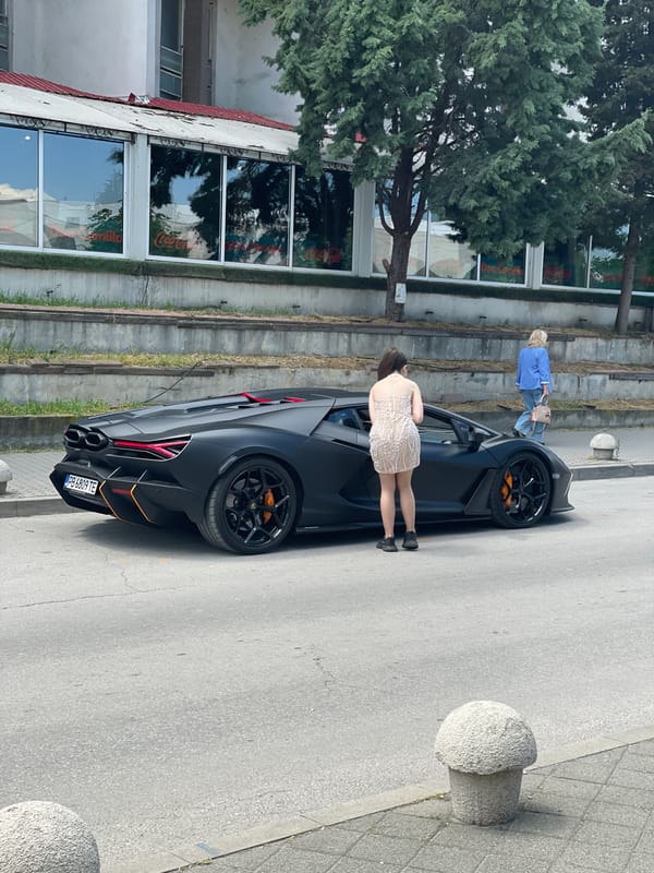 Woman poses with Lamborghini on Pazardzhik street