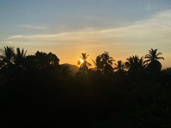 Golden sunset behind the hills of Ban Tai, Ko Samui