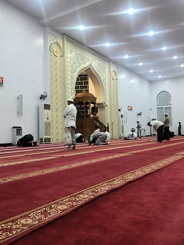 Evening prayers documented at Indonesian mosque complex