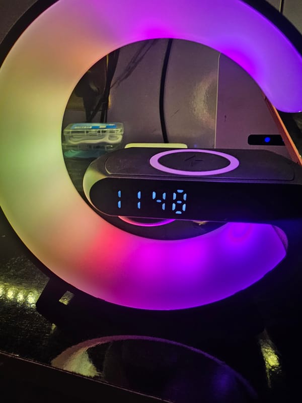 Electronic device with timer display and colorful light ring observed
