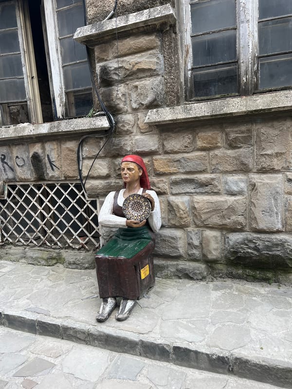 Tourist documents historic Veliko Tarnovo streets and medieval architecture