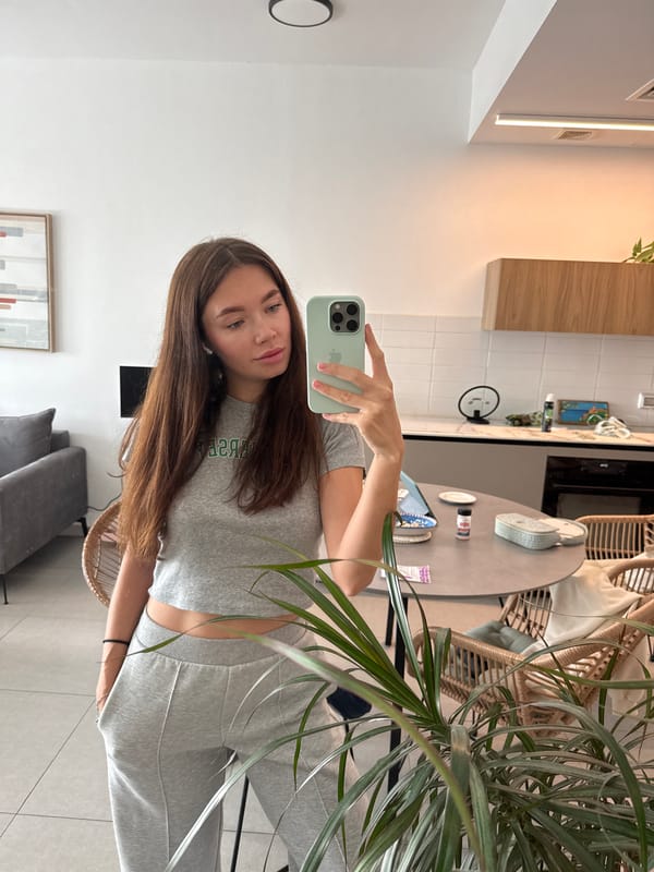 Woman takes morning selfie in Ramat Gan apartment