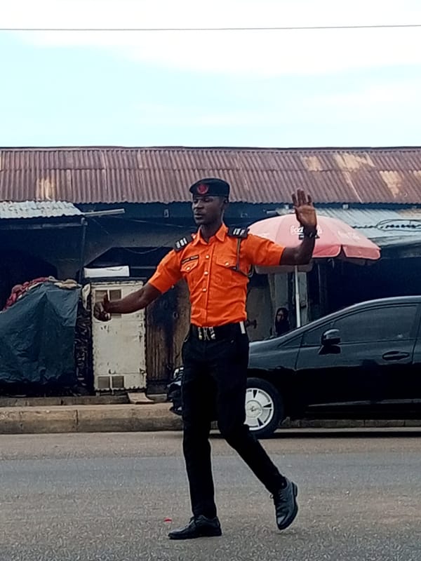 Morning street life documented across Nigerian urban area
