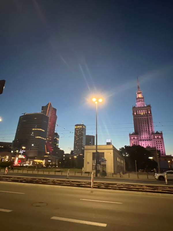 Warsaw city center at dusk, skyline and landmarks after sunset