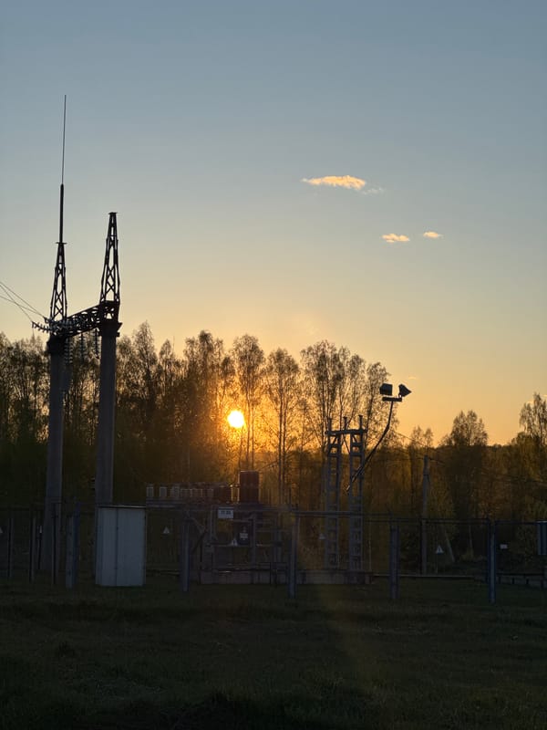 Sunset silhouettes electrical substation in Люкшудья, Russia