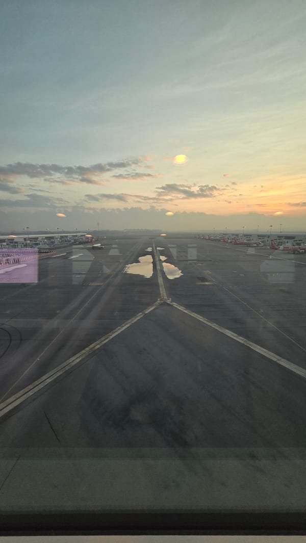 Wet runway captured at twilight in Sepang, Malaysia