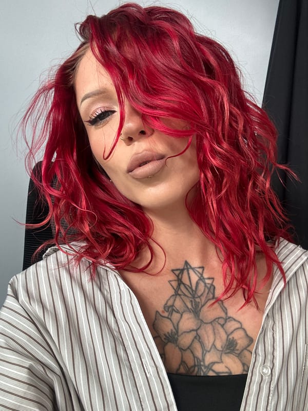 Red-haired woman photographed in portrait session, North Kuta