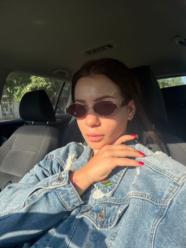 Woman plays with toy slot machine in car, Plovdiv