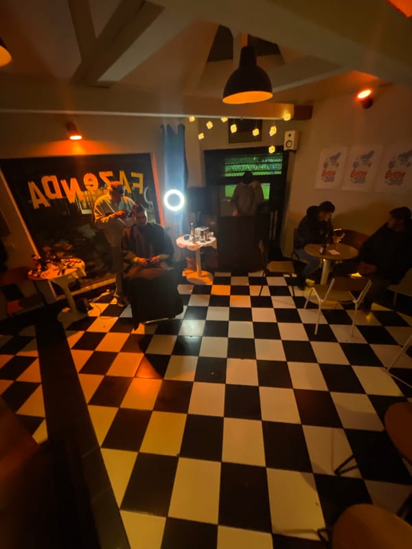 Barber gives haircut to customer in Belgrade barbershop
