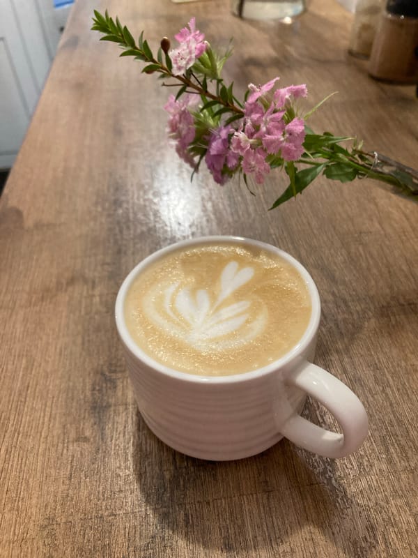 Lazy summer day in Chaikovsky, coffee and daisies indoors