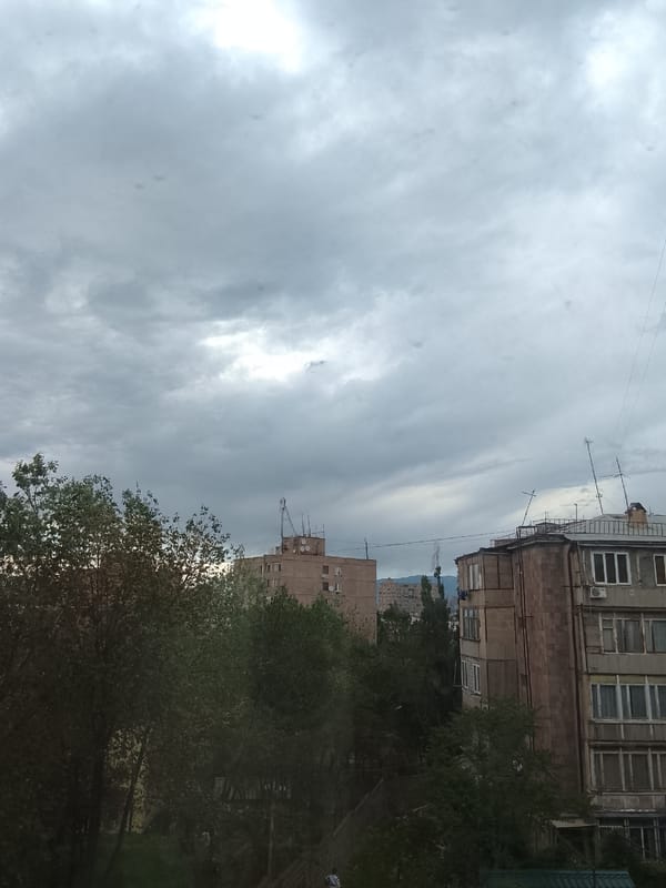 Dramatic cloudy skies documented over urban landscape