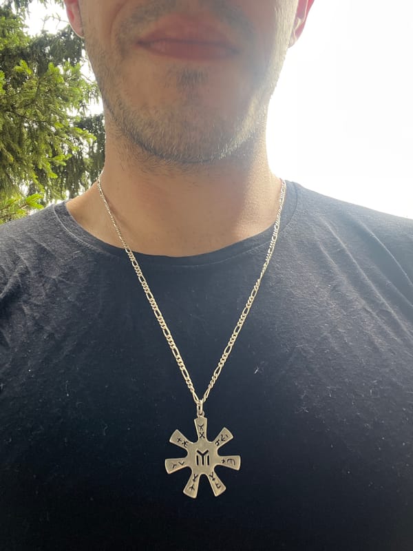 Star-shaped rune pendant on a silver chain, Sofia