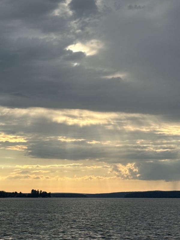 Boating on Votkinsk Reservoir under a dramatic stormy sky