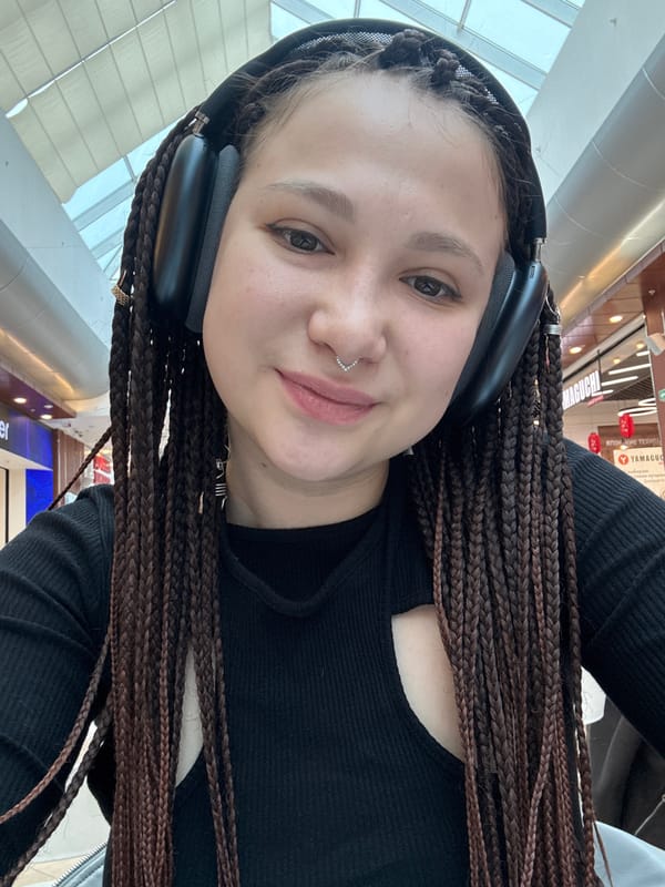 Woman takes selfie in indoor public space in Saratov
