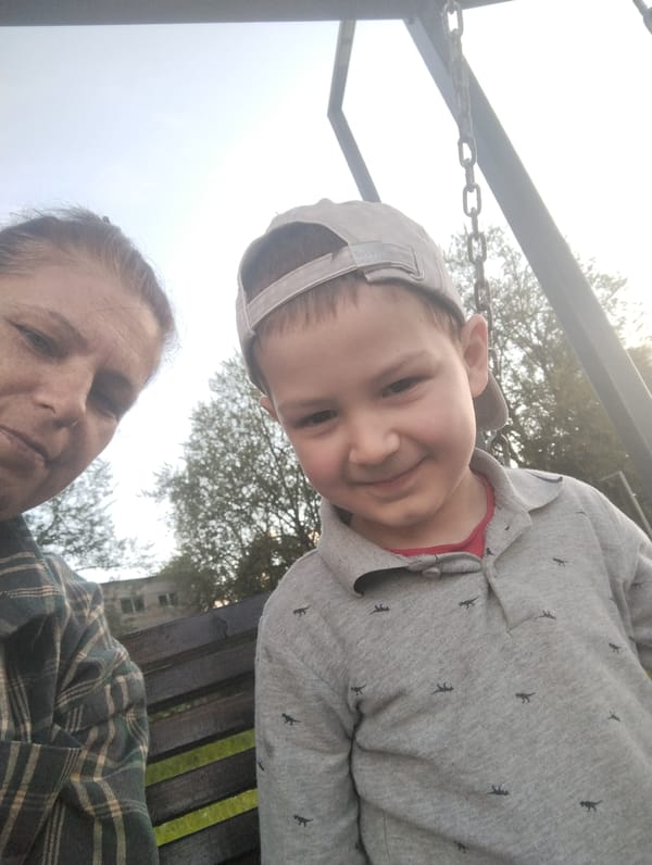 Afternoon at a Kingisepp park, swings and benches