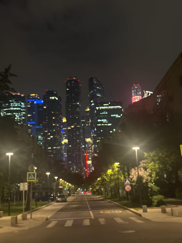 Moscow City skyscrapers photographed at night from street level