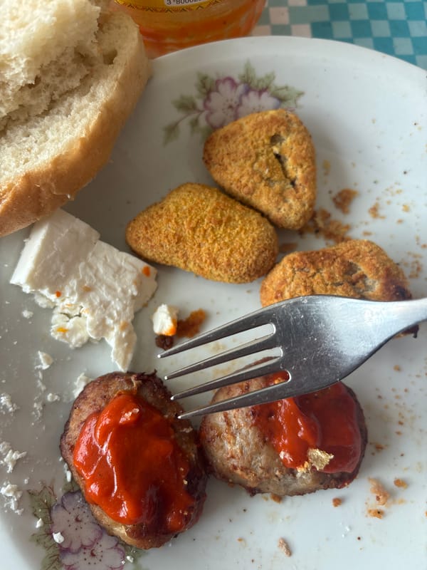 Traditional meal documented in Zlatograd, Bulgaria includes fried patties, sugared squash
