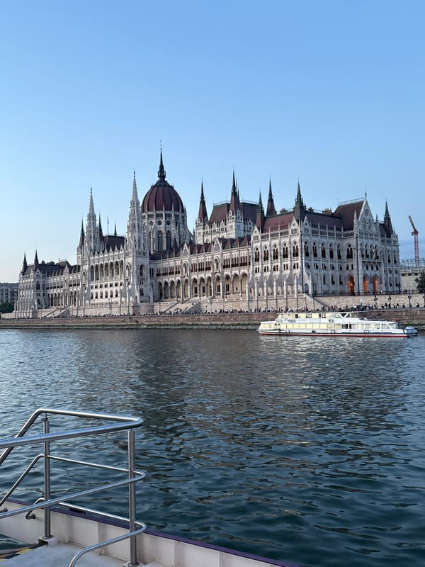 Budapest's Parliament and Chain Bridge glow at dusk