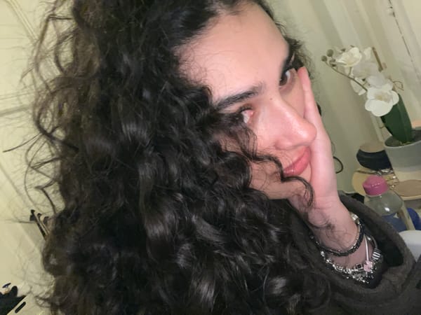 Early morning selfie session captured in Lyon apartment