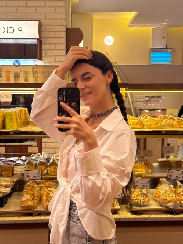 Woman documents bakery visit with photos in Phan Thiết
