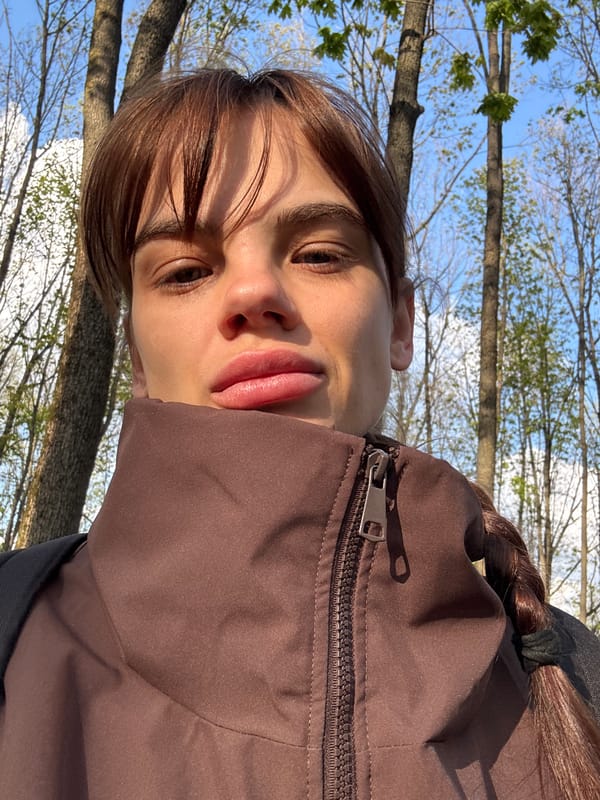 Young woman takes selfie session in Rostov-on-Don park