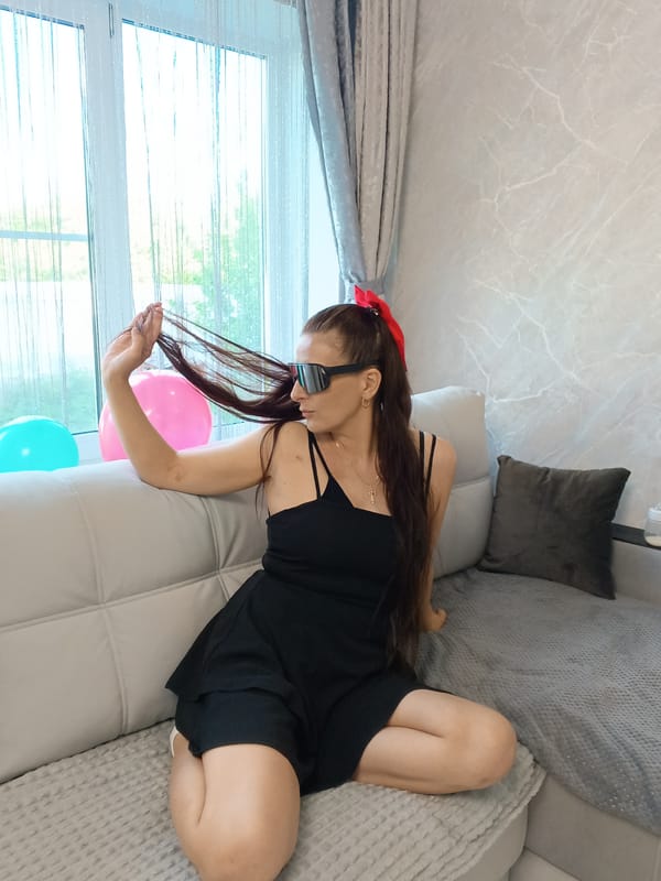 Woman celebrates with baby and balloons in Andreyevo