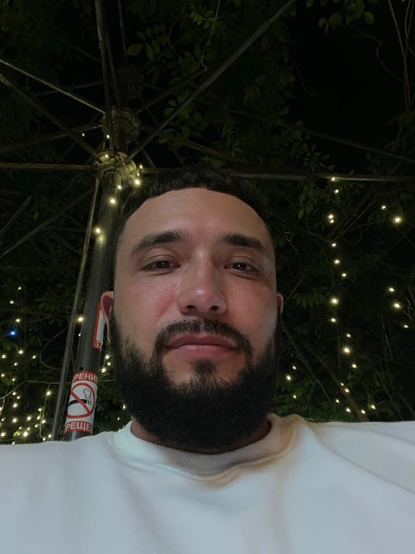 Nighttime selfies under string lights in Makhachkala