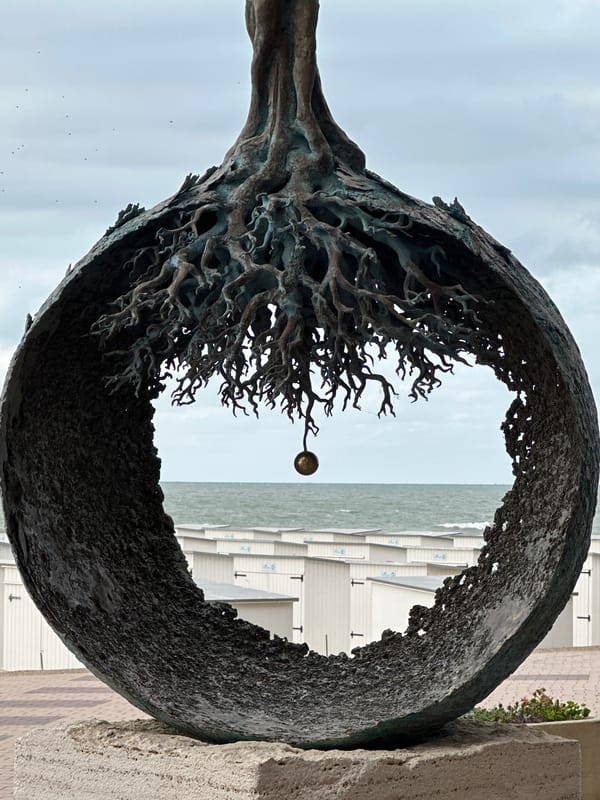 Tree sculpture with golden sphere on the Knokke-Heist seafront