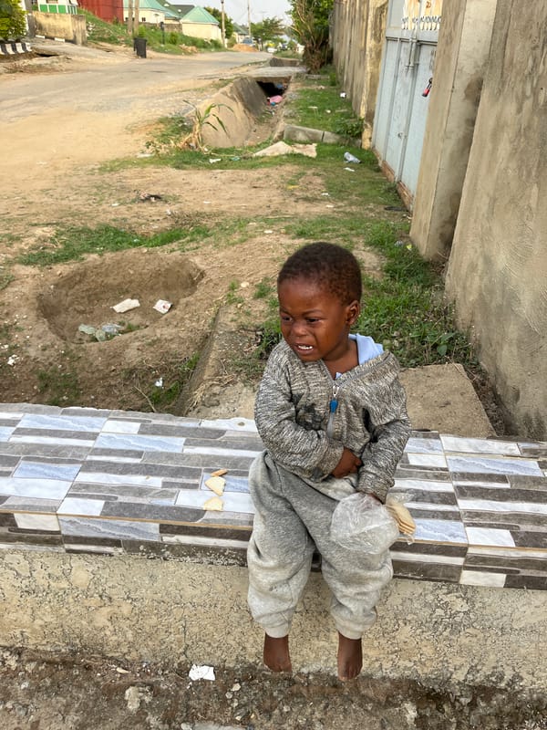 Morning street life documented across Abuja neighborhoods