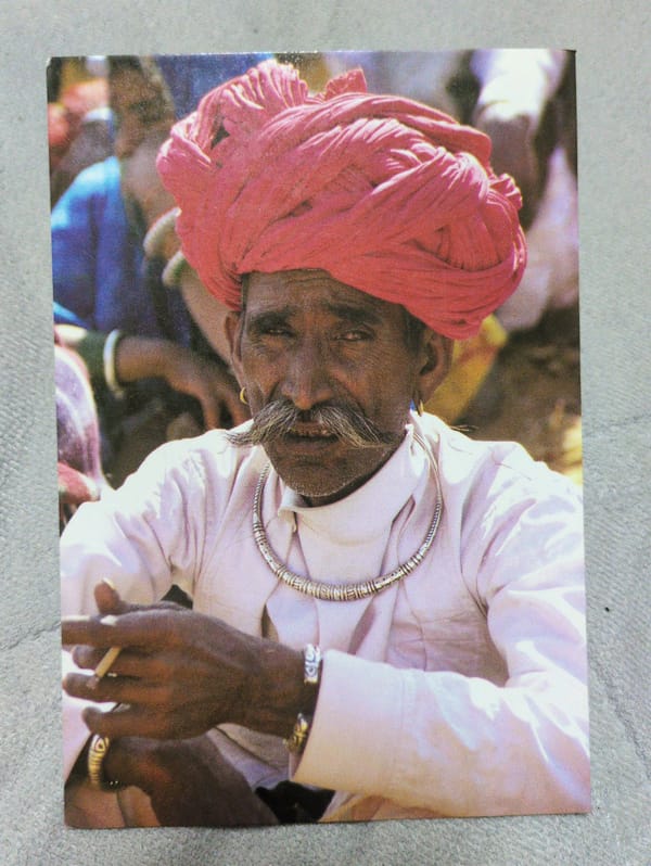 Man in red turban observed smoking in Iwon