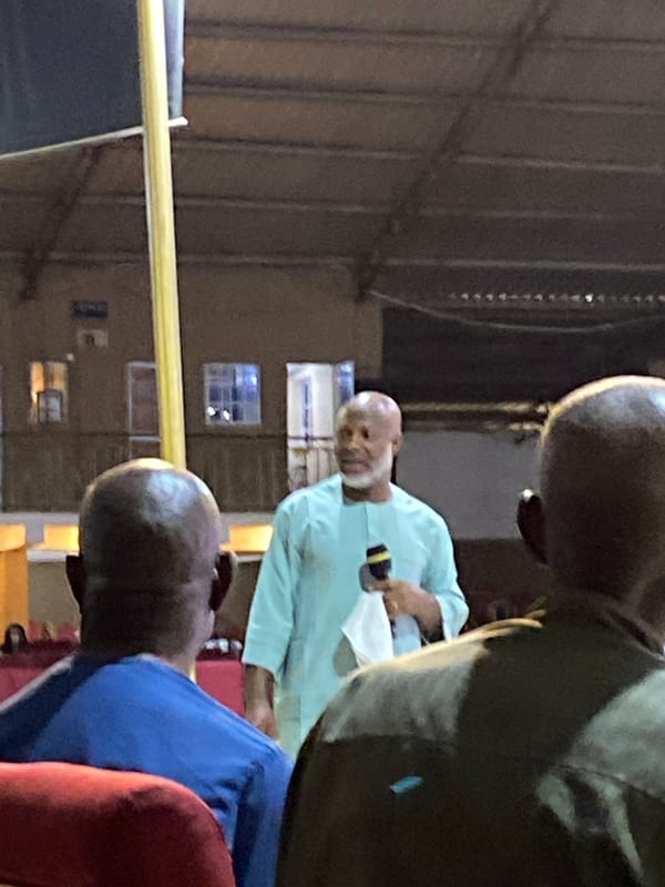 Religious gathering at an indoor hall on Rukuba Road, Nigeria