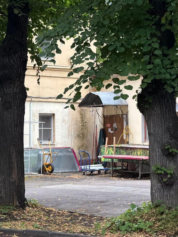 Moscow courtyard buildings, ornate brickwork and weathered facades