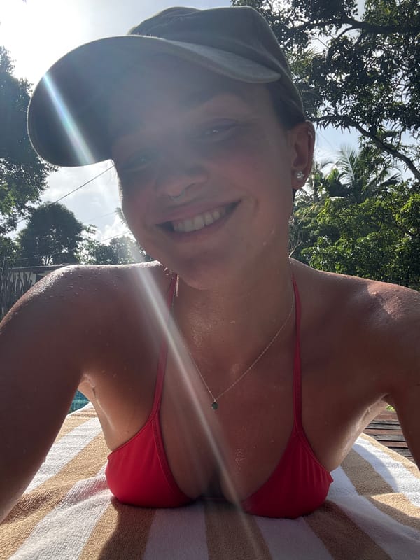 Lazy poolside morning in Kabalana with a very happy dog