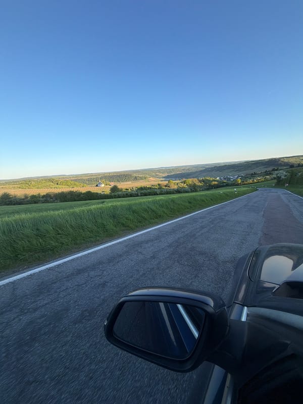 Early morning scenic drive captured in rural Nittel, Germany