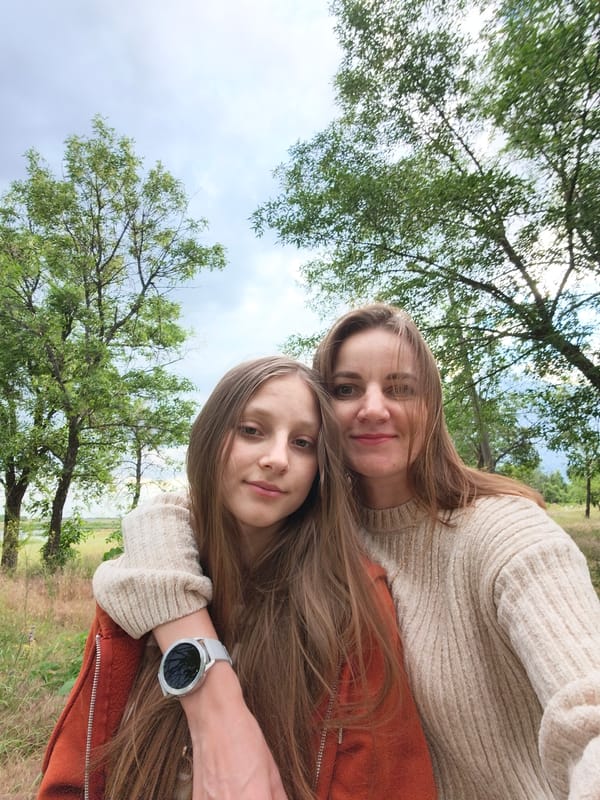 Wildflowers and storm skies along a Kryvyi Rih riverbank