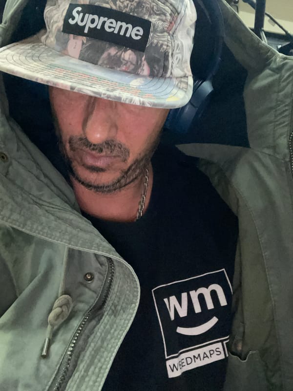 Person observed resting in Barcelona wearing casual clothing