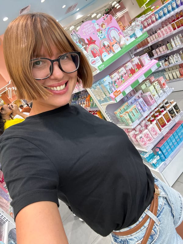 Woman takes selfie in skincare store in Kuta