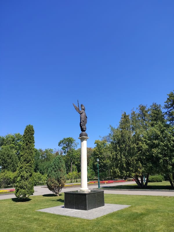 Summer morning in a Kharkiv park: sculptures, flowers, and details
