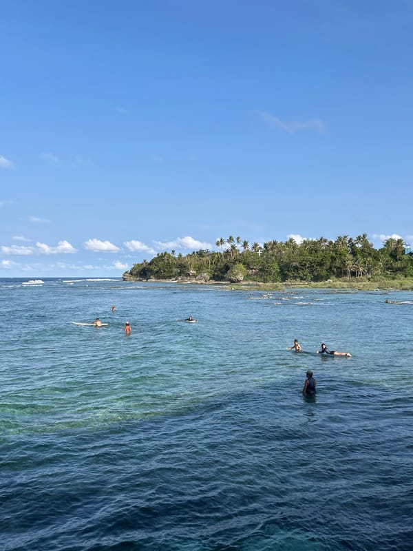 Morning beach activities captured at General Luna coastal waters