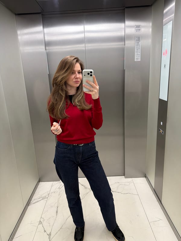Woman takes elevator selfie in Riga