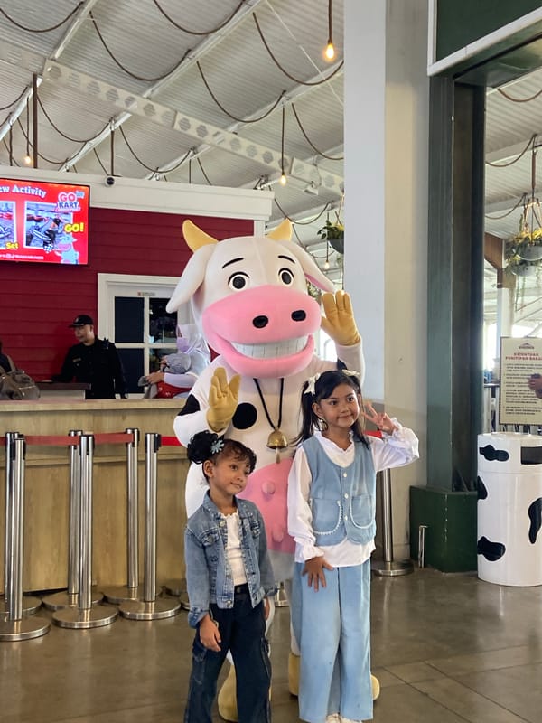 Visitors document dairy-themed tourist attraction in Prigen, Indonesia
