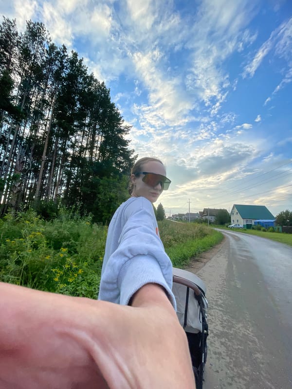 Stroller walk selfies on a quiet road in Podshivalovo, Russia
